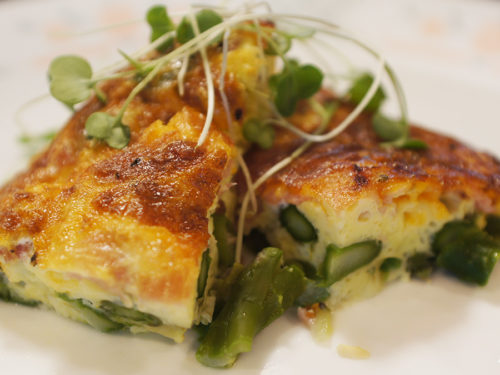 Crustless Blue Cheese, Asparagus and Ham Quiche served on a plate