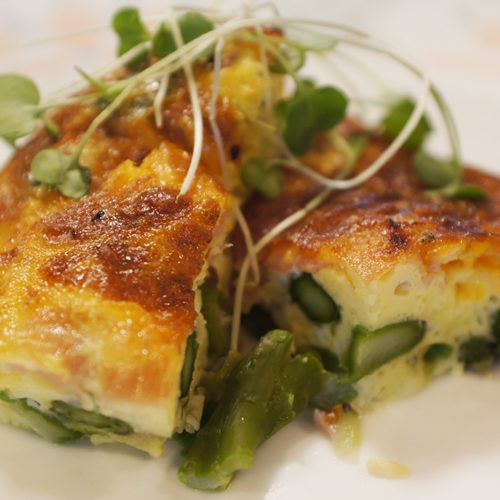 Crustless Blue Cheese, Asparagus and Ham Quiche served on a plate