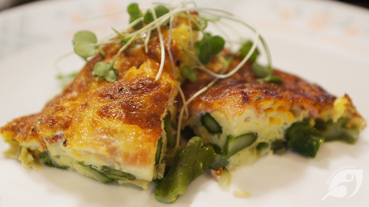 Crustless Blue Cheese, Asparagus and Ham Quiche served on a plate