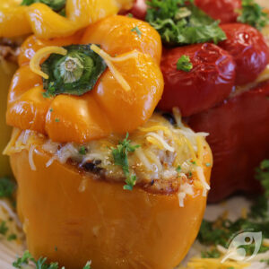 Mexican Stuffed Peppers on a plate with cheese