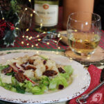 plate with lettuce greens, anjou Pear and seared sea scallops with candied pecans