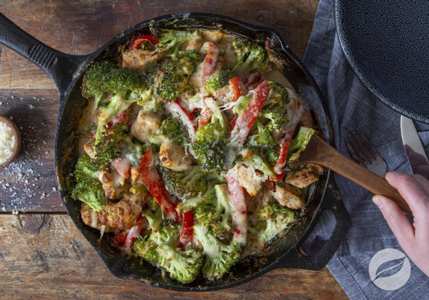 Cajun Chicken Alfredo Bake in a cast iron skillet