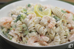 Plate servings individually or transfer all of the salad to a large bowl for family-style or potluck serving. Garnish with lemon slices, a lemon wedge, or sliced scallions on top.