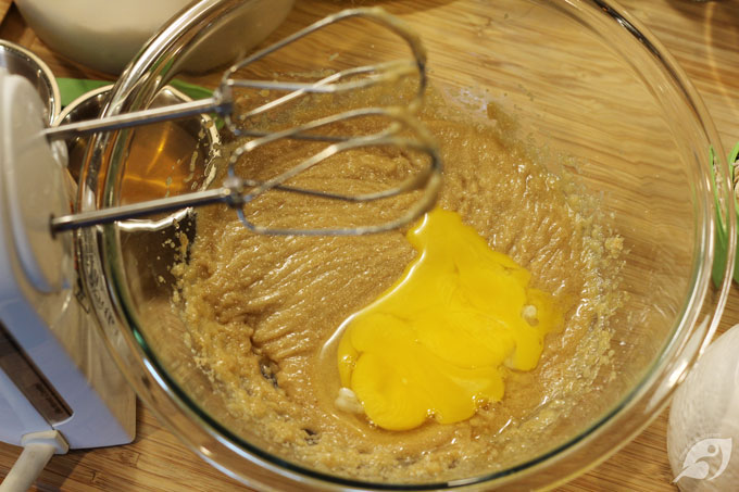 Step 2 - Cream the melted butter and brown sugar together in a large bowl or stand mixer, beating until smooth and creamy. Next, add the egg yolks and vanilla.