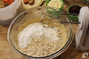 Step 5 - Mix in the flour followed by the old-fashioned oats, mixing until combined.