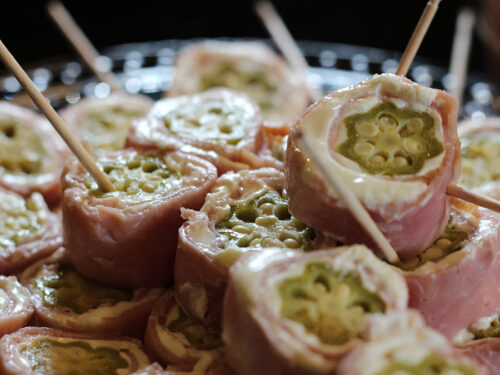 Ham Roll-Ups a.k.a. Minnesota Sushi, Okra Dokies, or Traditional… closeup dark background