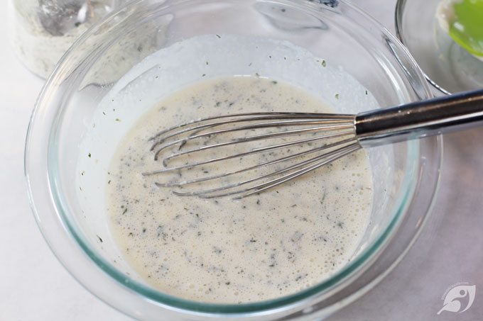 Homestyle Ranch Dressing & Dip Mix ingredients whisked together in a bowl.