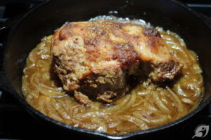 When caramelized, push the onion to the sides of the dutch oven before placing the roast fat side up back into the pot. Then, add the beef broth, cover with the lid and place the covered pot into the preheated oven to braise for about 2-1/2 (+/-) hours.