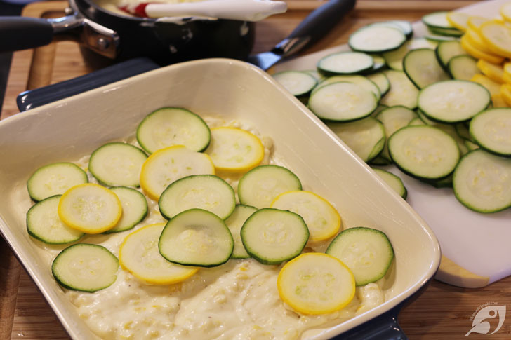 Spread an even layer of sauce and corn mixture (about one-third) over the bottom of the baking dish. Arrange an even layer of summer squash over the sauce.