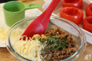 ...then the cooked and cooled sausage, mozzarella (reserving a small amount for topping at the end), parmesan cheese, basil, garlic, salt, and pepper.