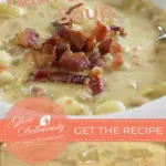A beautifully captured image of a bowl filled with vibrant and aromatic Creamy Ham and Potato Soup garnished with crispy bacon pieces.