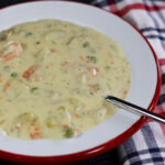 1080x1080px Instagram share image featuring a bowl of seafood chowder.