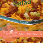 1080x1920 px Pinterest share image of a styled photo showing a clear dish arranged on a green placemat with seven-layer salad in it.