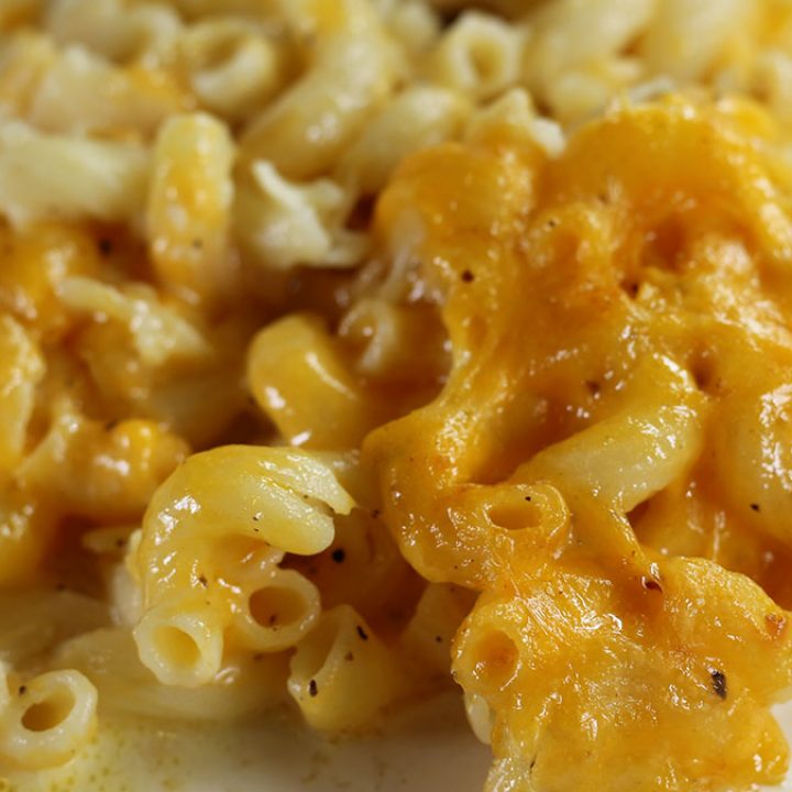 Closeup of baked macaroni and cheese on a plate, 728x728px